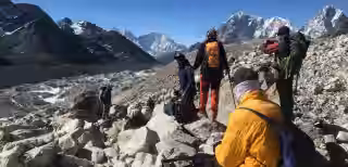 Hiker with packed baggage on Everest trek Hiker with packed baggage on Everest trek