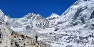 Trekker approaches snowy Everest Base Camp with all essential gears