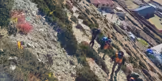 Trekkers climbing uphiill on EBC route