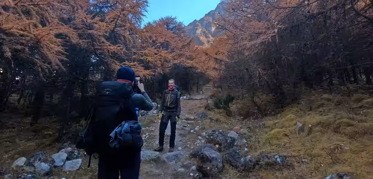 Trekkers joyfully taking photos in Nepal