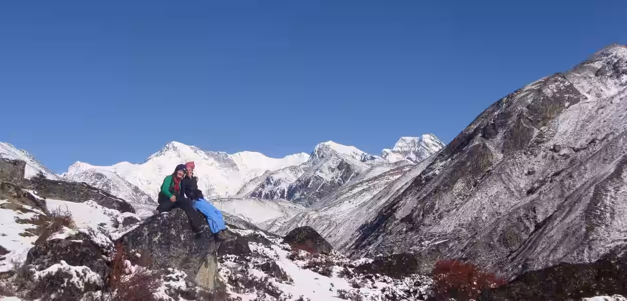 Female Travellers enjoying the snow capped view of EBC