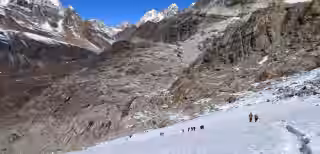 Snow-covered path winding toward EBC