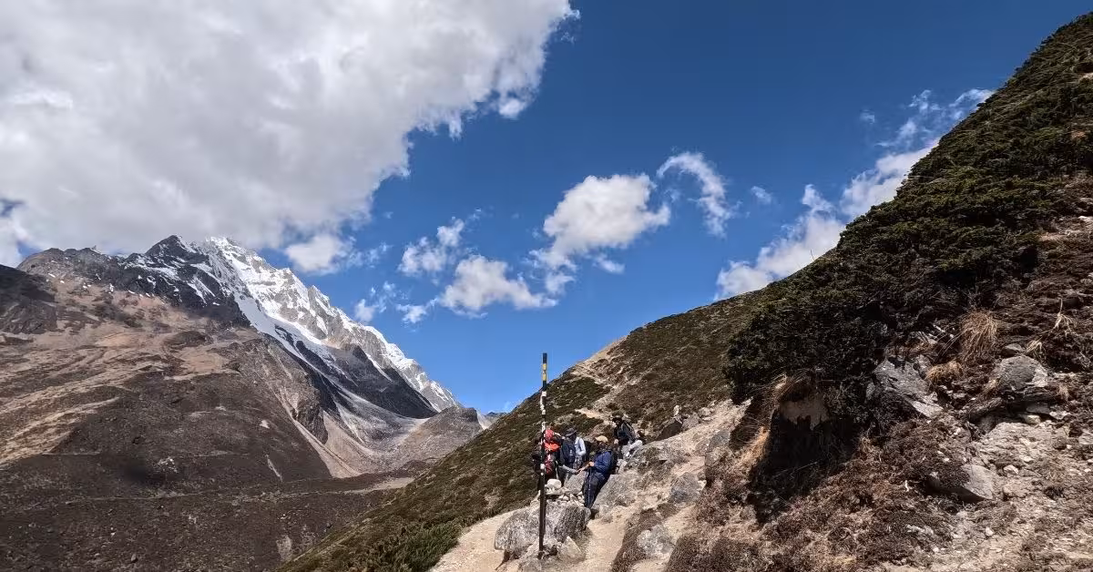 Trekker resting with Himalayan view in Manaslu Circuit