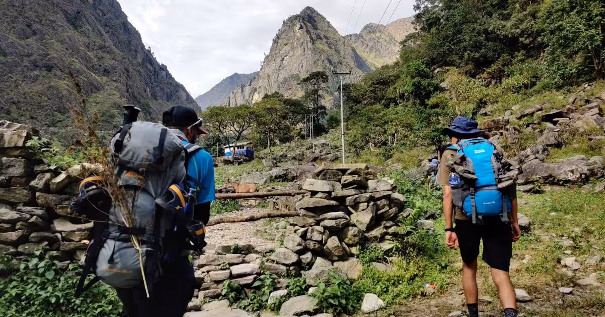 Trekking duo moving through high-altitude Manaslu trail