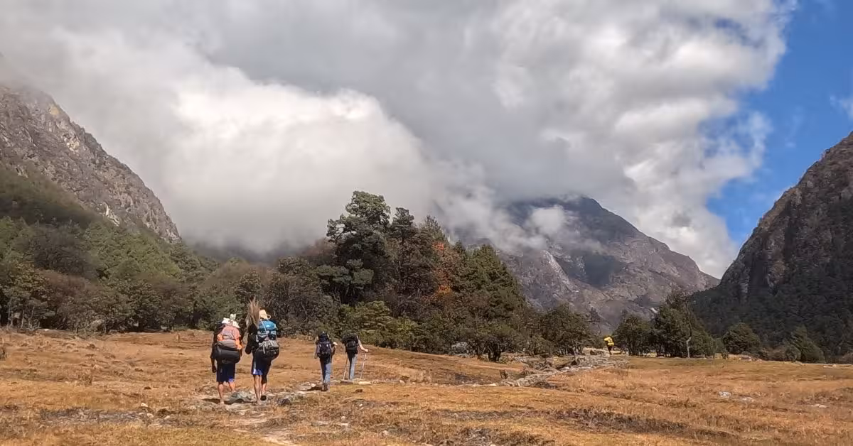 trekking in kanchenjunga circuit with guide and porters