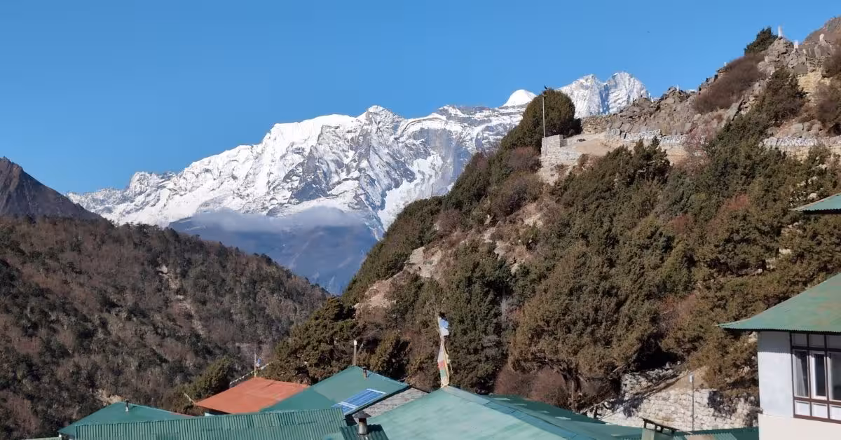 Everest view in September with clear post-monsoon skies above Namche rooftops
