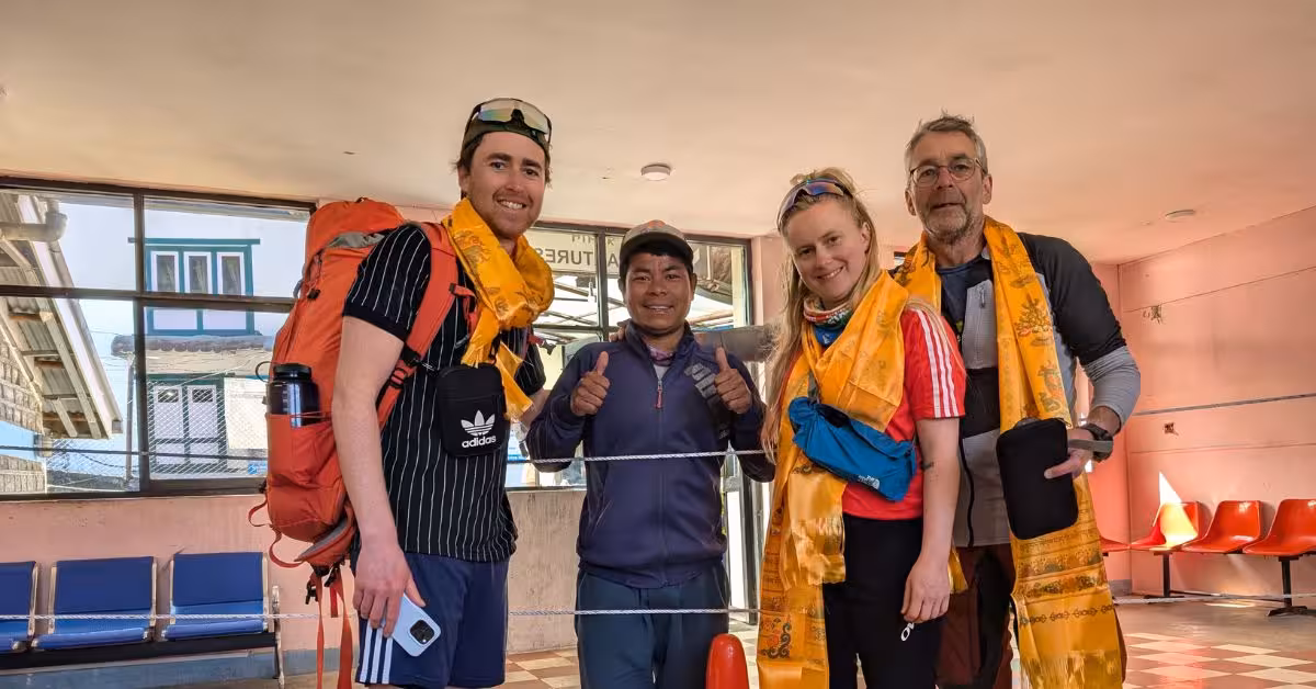 Trekkers ending their Everest Base Camp journey with blessings and smiles