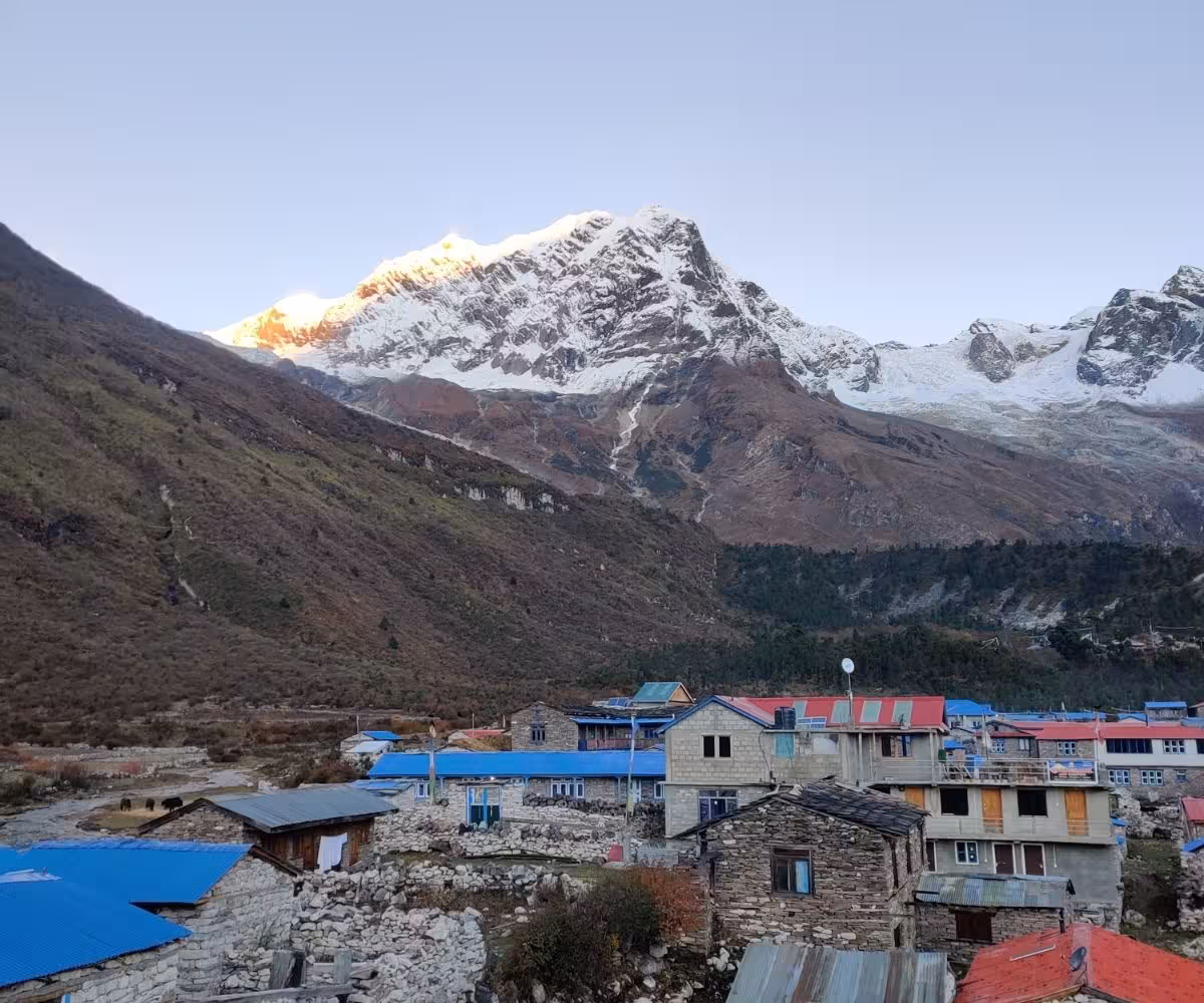 Morning sunlight over Samagaun village rooftops