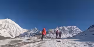 skilled trekkers navigating rugged mountain trail.jpg skilled trekkers navigating rugged mountain trail