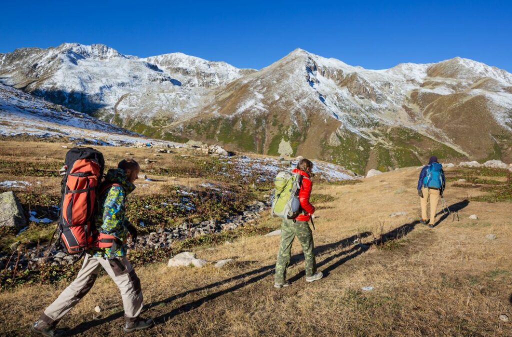 people trailing together for trek