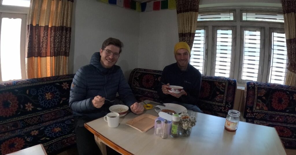Trekkers enjoying meal in Kanchenjunga teahouse